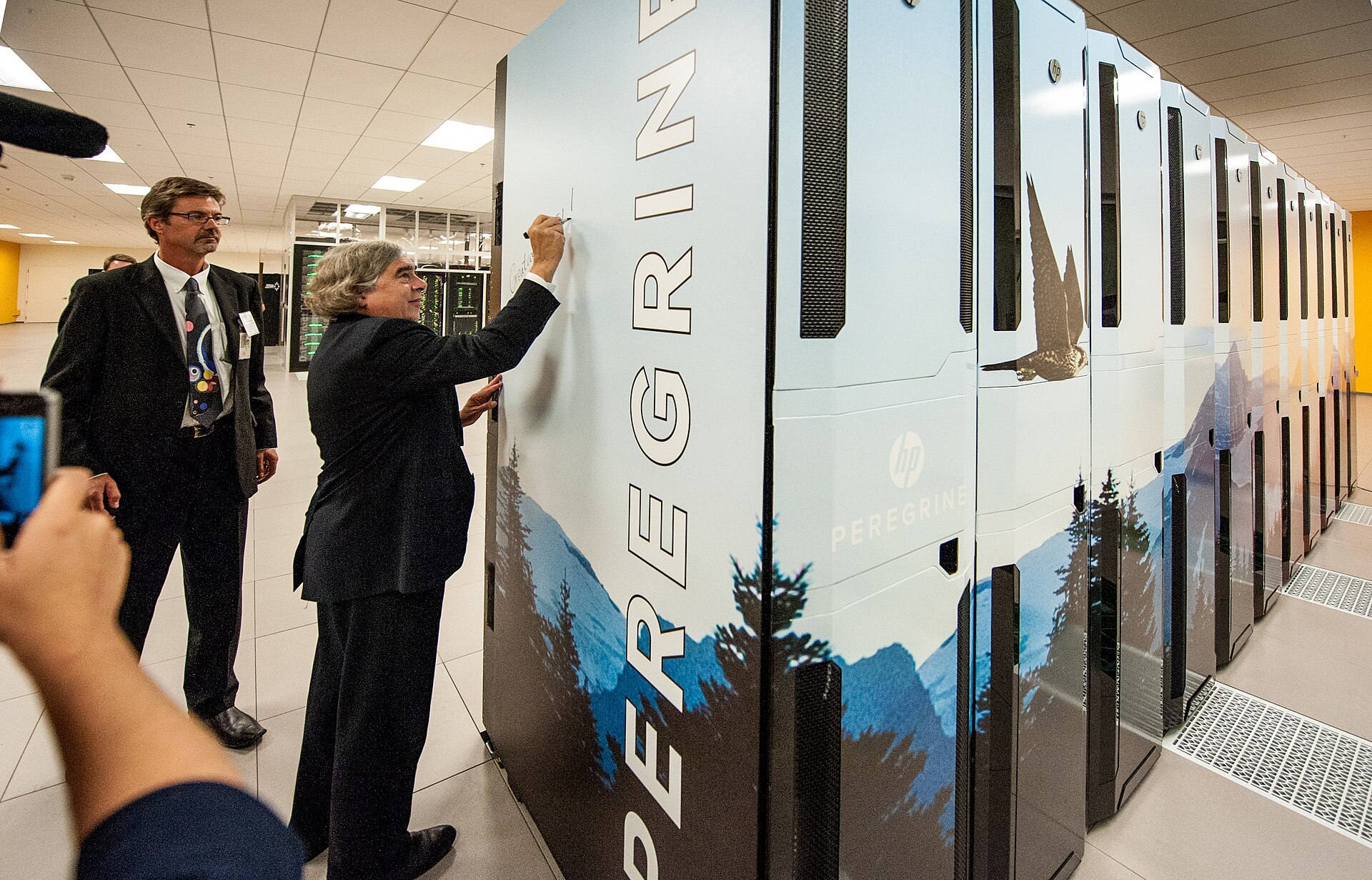 Unveiling the warm-water, liquid-cooled Peregrine supercomputer at NREL’s data center in Golden, Colorado, 2013.